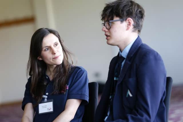 Mentor Christina Edscer chats with a student from The Angmering School