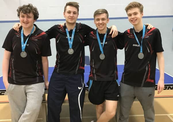 Horsham Blades Table Tennis Club celebrate winning silver medals for finishing runners-up in the Senior British League after winning four matches out of four in Southampton. From left - Ryszard Pelc, Emil Ohlsson, Gustav Fahlen and George Hazell. SUS-170322-124813002