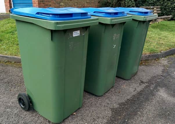 Blue bins used by homes in the Horsham District for recyclable waste. SUS-150403-171245001