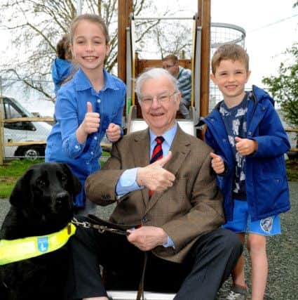 David Whyberd, vice chairman of Washington Parish Council, with Maddie Woolgar, 10, (left) and Beau Harris, 5, (right). Picture: Steve Robards