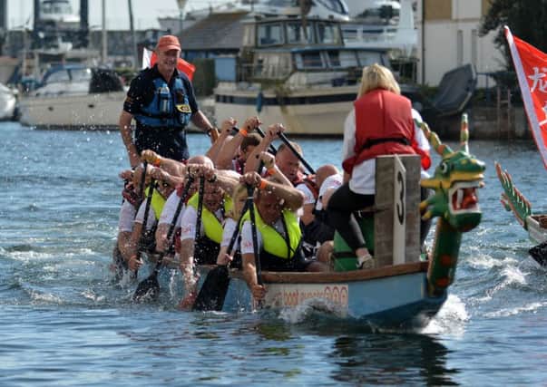 Row your way to victory in the Rockinghorse Dragon Boat Race (Photograph: Phil Westlake) SUS-170413-141043001