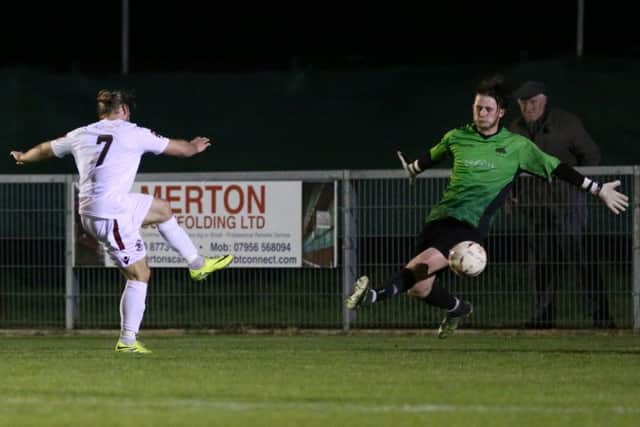 Matt Bodkin scores Hastings United's third goal against South Park. Picture courtesy Scott White