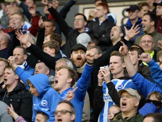 Albion fans cheer their side on at Molineux yesterday. Picture by Phil Westlake (PW Sporting Photography)