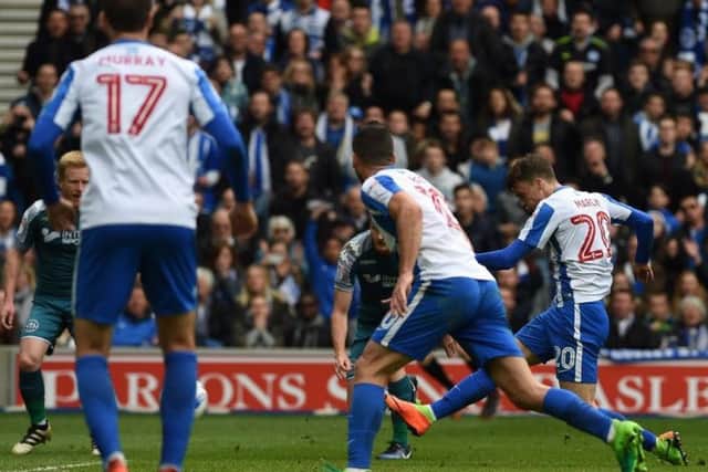 Solly March fires Brighton & Hove Albion into a 2-0 lead against Wigan Athletic