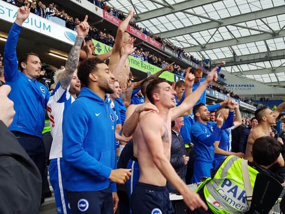Albion players celebrate promotion.