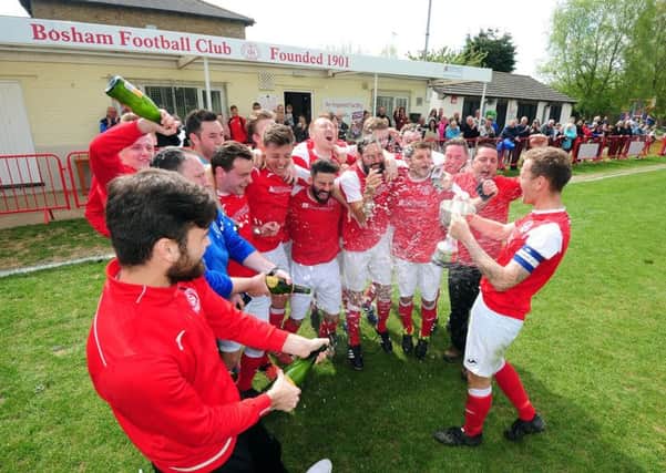 Bosham celebrate their title win / Picture by Kate Shemilt