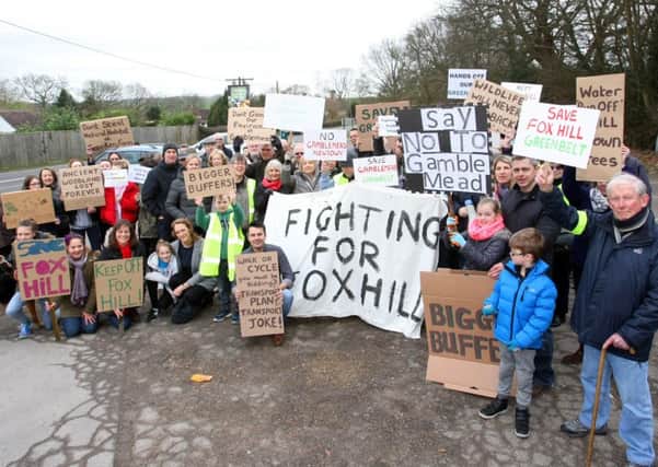 Almost a hundred residents came together to protest with banners and posters in Fox Hill in February. Picture: Derek Martin