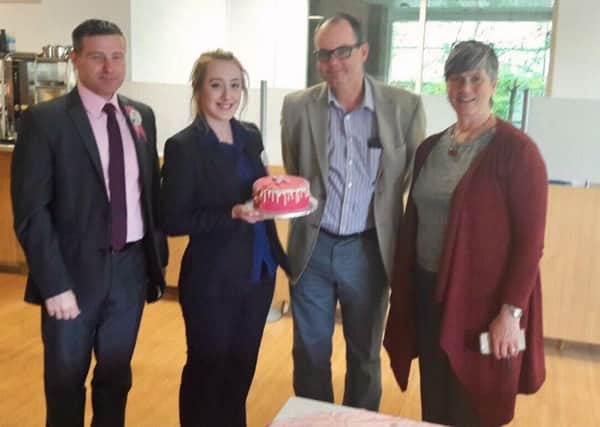 Store manager Bryan Clarke  with Lizzie and Trevor Judd from Lizzies Food Factory who came to judge cakes and Shaunagh Wheelen with her winning cake