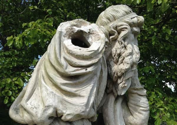 The coade stone statue is now missing an arm after the attack over the Easter weekend. Picture by Edward Milward-Oliver