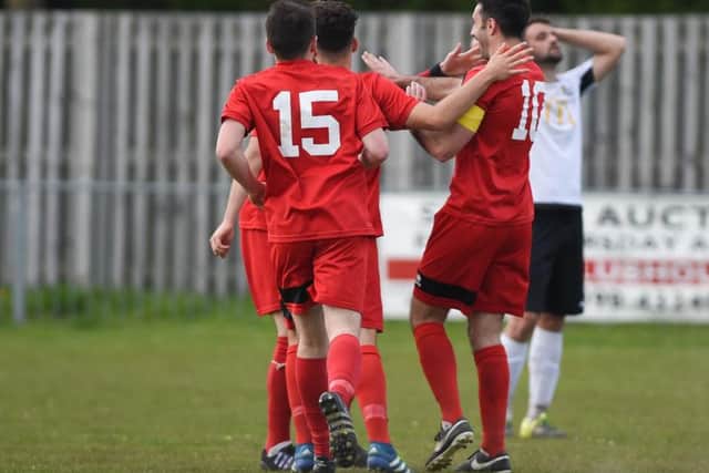 Players celebrate Gault's winner. Picture by PW Sporting Photography
