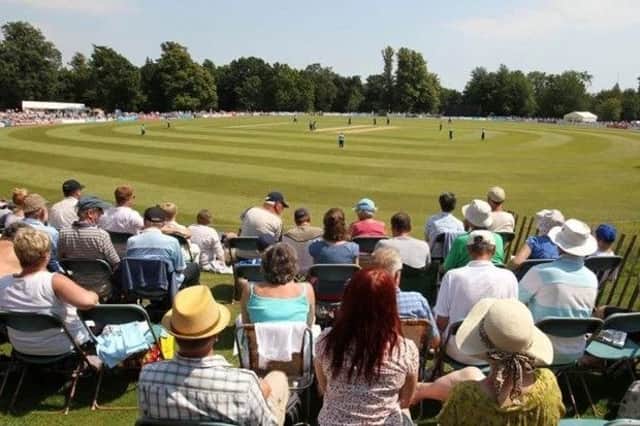 Spectators take in some action at the famous Arundel Castle Cricket ground last summer