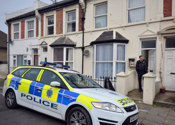Police outside a house in St Mary's Road, Hastings. SUS-170420-095503001