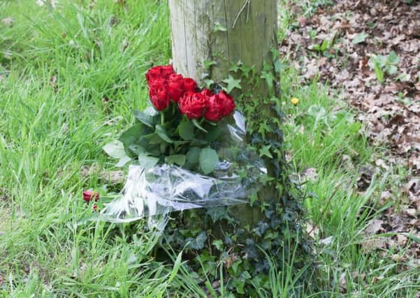 Flowers have been left at the scene. Picture: Eddie Mitchell