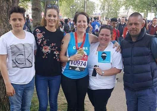 London Marathon runner Clair Overfield (centre) with son  Harry, daughter Elize, sister Gemma James and husband Zak. SUS-170426-120704001