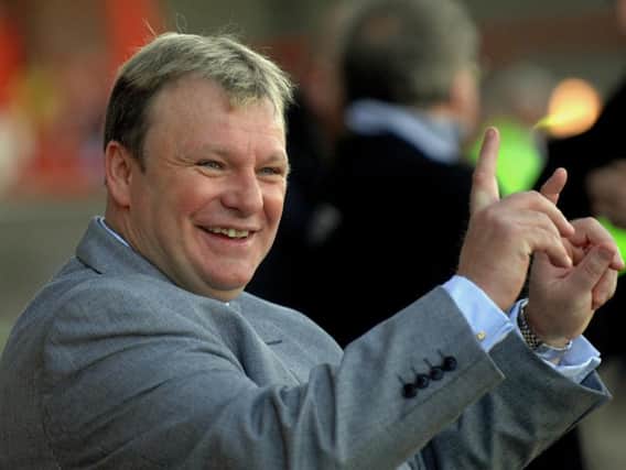 Steve Evans smiling in his Crawley Town days. Picture by Jon Rigby