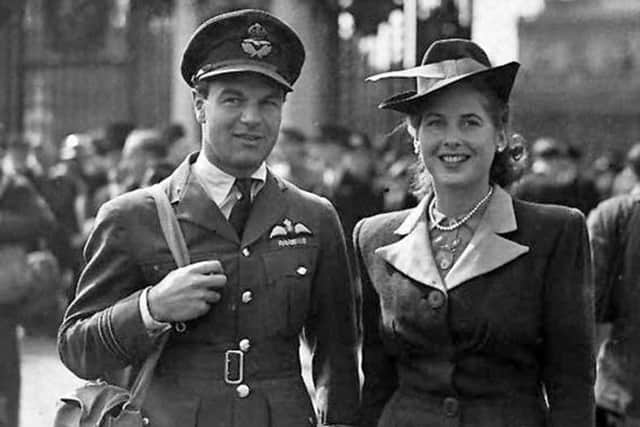 Max Aitken with his wife after receiving the DFC at Buckingham Palace in 1940