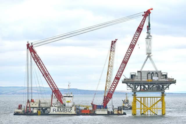 The the installation of the 2,000 tonne offshore substation at Rampion, situated 14 kilometres off the Sussex coast. Picture: Alan O'Neill