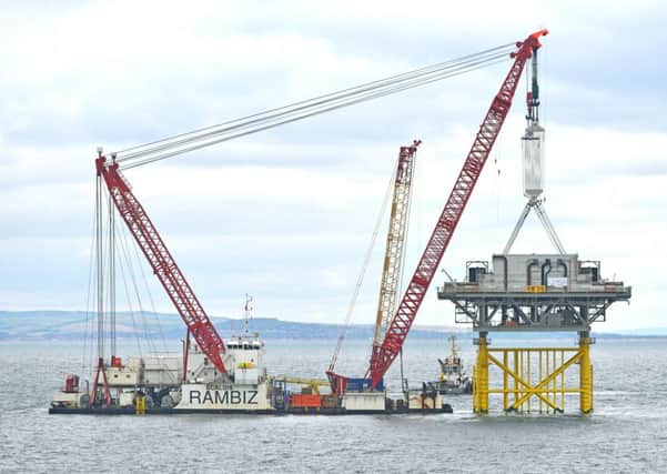 The the installation of the 2,000 tonne offshore substation at Rampion, situated 14 kilometres off the Sussex coast.  Picture: Alan O'Neill