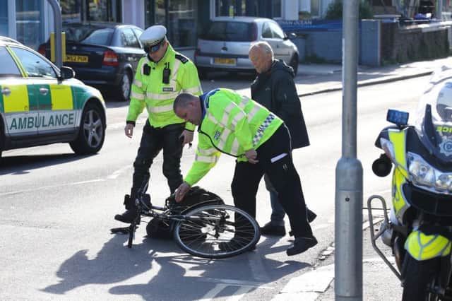 RTC TARRING RD WORTHING. Street scene includes member of the public not connected with the incident. Photo by Eddie Mitchell.