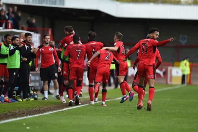 Crawley Town players celebrate their third goal in their 3-3 draw with Carlisle United.
Picture by PW Sporting Photography