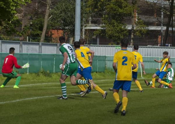 Chi City on the attack against Lancing / Picture by Tommy McMillan