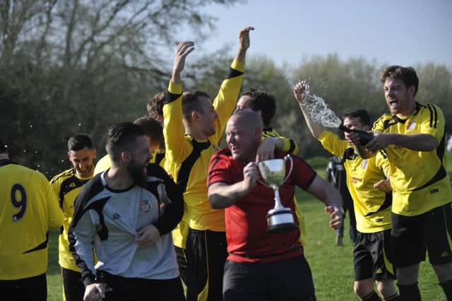 Rye Town will be hoping to get the champagne flowing again after tonight's cup final. Picture by Simon Newstead