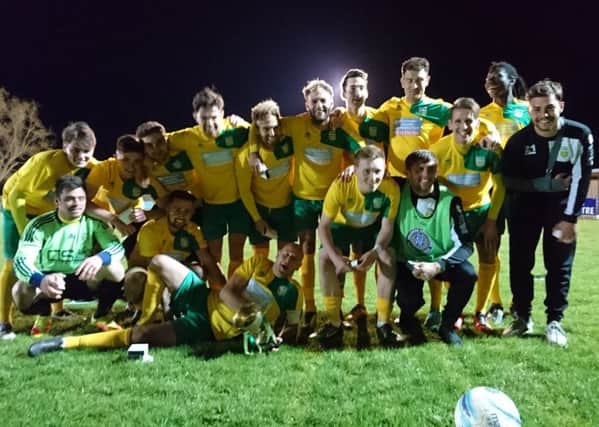 Sidlesham celebrate the cup win / Picture by Caroline Henry-Evans