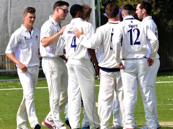 Worthing celebrate a wicket last season. Picture by Stephen Goodge