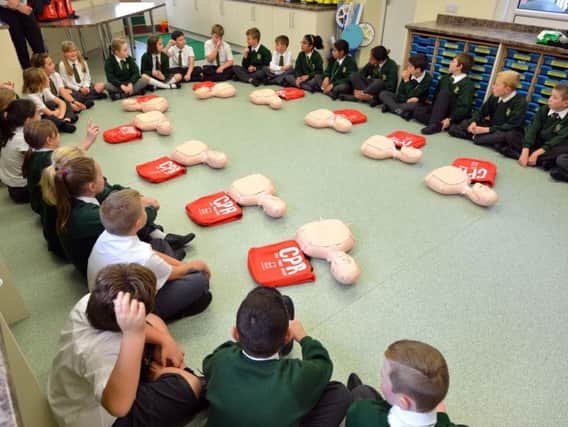 Pupils at St Peter and St Paul CEP School, Bexhill, participating in Restart a Heart 2016.