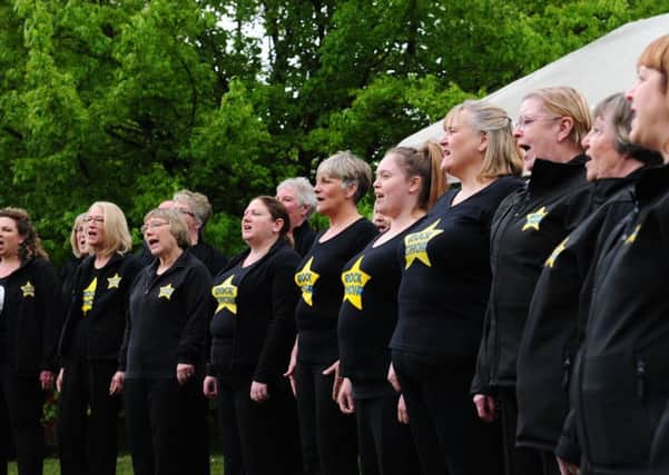 Members of the Rock Choir performing at this years Plaistow Pre-School Maypole Fete. Pictures: Kate Shemilt ks170866-2