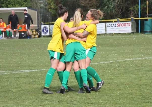Chi celebrate one of the four goals that sank Cheltenham / Picture by John Holden