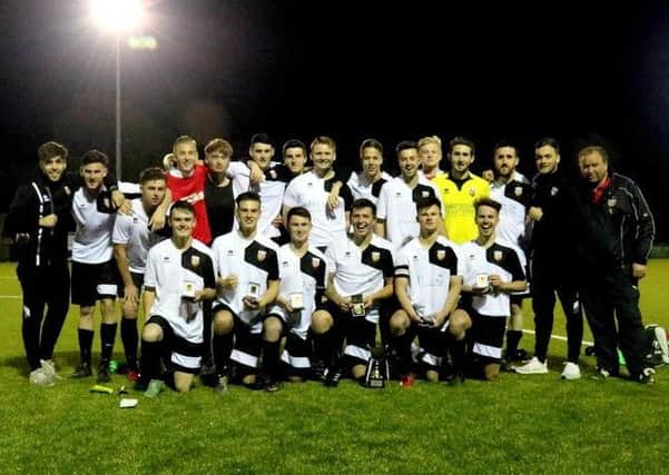 Pagham under-21s with the cup / Picture by Roger Smith