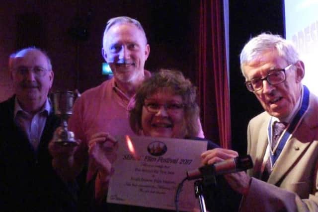 Members of the South Downs Film Makers celebrating their win at the Seriac Film Festival on April 8
