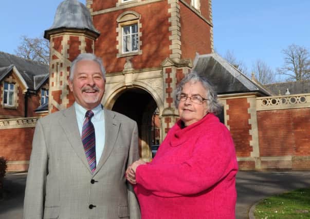Councillor Chris Mullins with Kate Oliver, chairwoman of the Friends of Worth Park group outside Ridley's Court. Picture: Jon Rigby