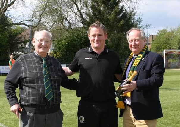 Club physio Andi Marfleet acknowledge for his service to the club from president Frank King and director Mark Butler