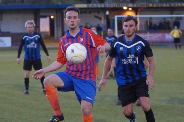 Dale Vinall on the ball for Battle Baptists against Hollington United in the Premier Travel Challenge Cup final. Picture courtesy Andrew Hazelden