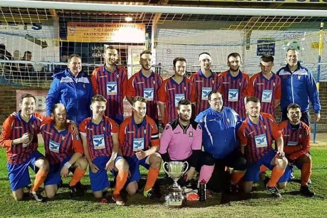 Battle Baptists celebrate with the Premier Travel Challenge Cup. Picture courtesy Andrew Hazelden