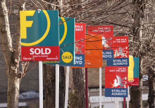 File photo dated 01/03/15 of For Sale signs, as the average price tag on a home leapt to a new record high of more than Â£307,000 in April as a last-minute rush of buy-to-let investors energised the market, a website has reported. PRESS ASSOCIATION Photo. Issue date: Monday April 18, 2016. Across England and Wales, sellers coming to market are demanding Â£307,033 typically for a property - which is Â£3,843 more than in March - Rightmove said. See PA story MONEY House. Photo credit should read: Yui Mok/PA Wire PPP-160418-142450001