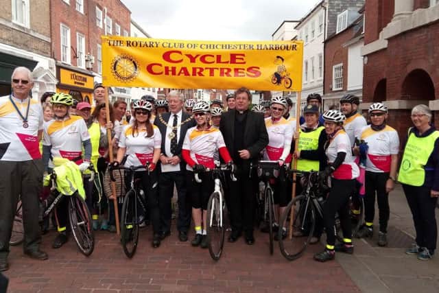 Chichester Harbour Rotary Club president Ken Holmes, the Very Rev Stephen Waine, Dean of Chichester, and Chichester mayor Peter Budge set the cyclists on their way