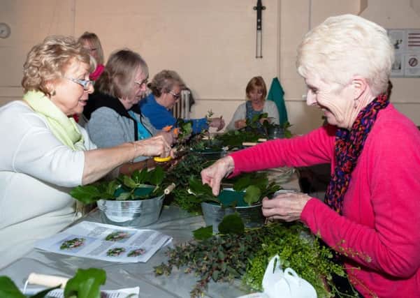 Creating arrangements at the spring flower workshop