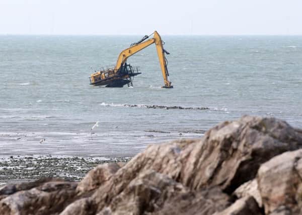 Moby Dig is fast becoming a landmark. But could it have been rescued during the low spring tide? Picture: Eddie Mitchell