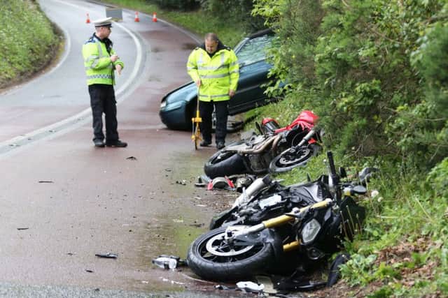 A collision between one car and two motorcyclist closed the A272 between Midhurst and Petworth yesterday afternoon. Picture: Eddie Mitchell