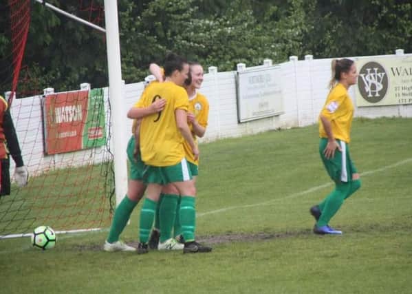 Chi City Ladies score one of their 13 goals against Exeter