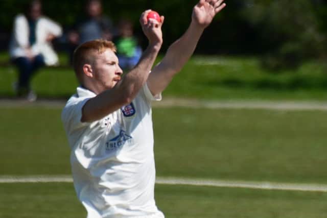 Bradley Payne bowling on his home debut for Bexhill. Picture courtesy Andy Hodder