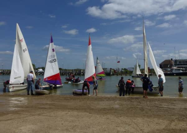 Rye Harbour Sailing Club dinghies getting ready to set sail at a previous Push The Boat Out event. SUS-170205-101834001
