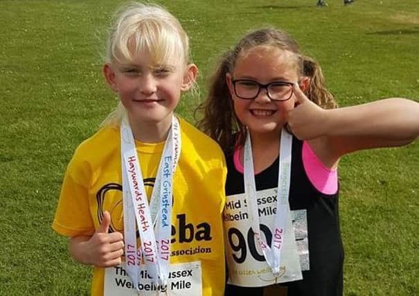 Twin sisters Mia (left) and Lily after the Wellbeing Mile