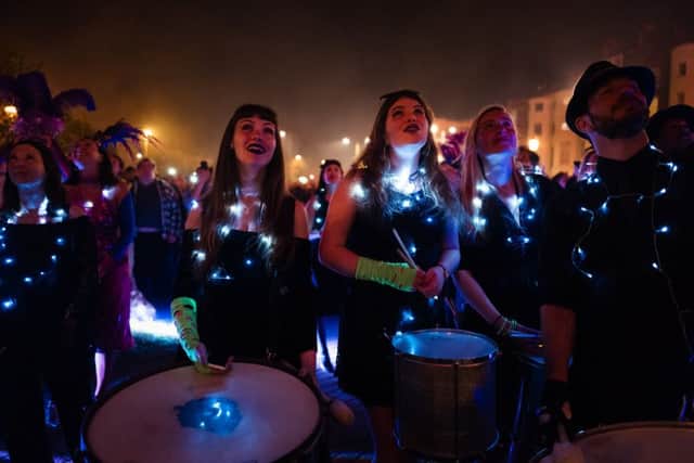 Drummers watch the opening fireworks last year (Photograph: James Bellorini)