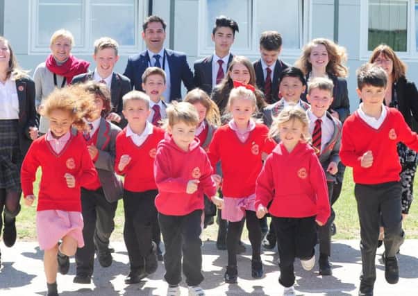 Staff and children from Chichester Free School