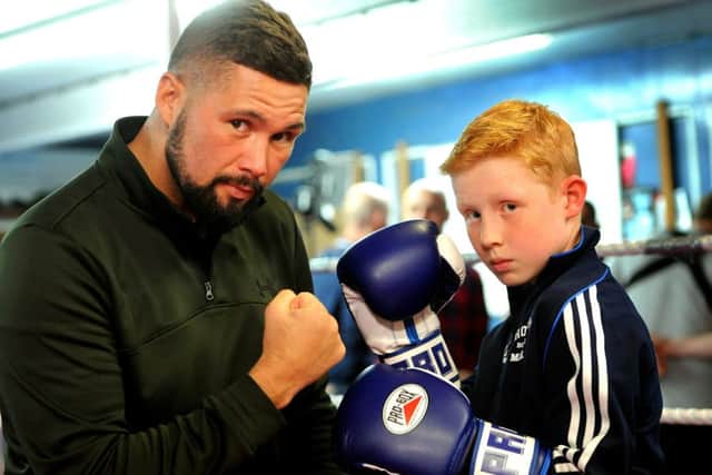 Tony Bellew at Horsham Boxing Club filming for ITV. Seen here with local hopeful Max Cole. Pic Steve Robards SR1709484 SUS-170305-112911001