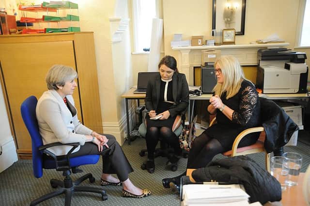 Prime Minister's Theresa May speaking to Annemarie Field and Ginny Sanderson